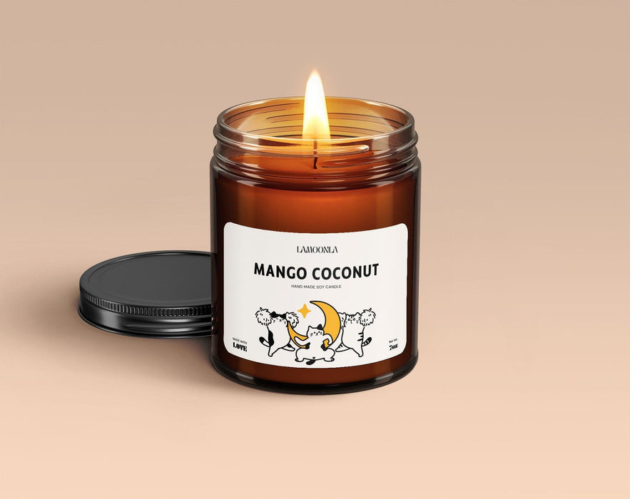 Indulge in Lamoonla - Mango & Coconut Candle, a soy wax creation handmade with care in the USA. Escape into the rich aroma of mango, coconut milk, orange, pineapple, sugar.  #HandmadeCandle #SoyWax #MadeInUSA