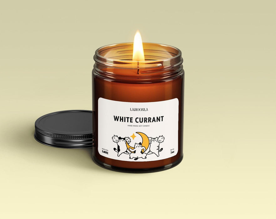 Indulge in Lamoonla - White Currant Candle, a soy wax creation handmade with care in the USA. Escape into the rich aroma of currant, lemon peel, geranium, juniper, peppermint.  #HandmadeCandle #SoyWax #MadeInUSA